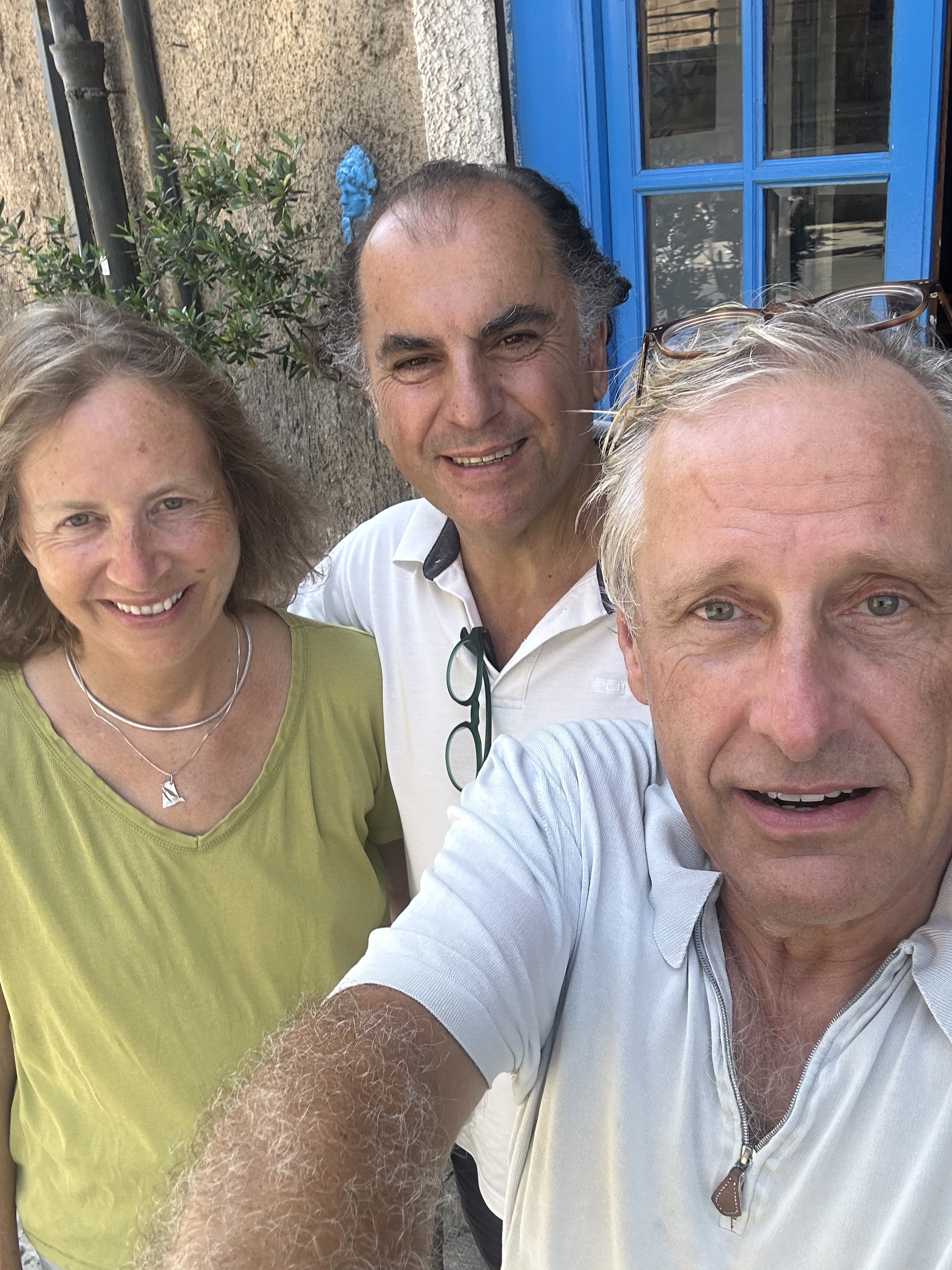 Pierre with friends on a summer day in a French village.
